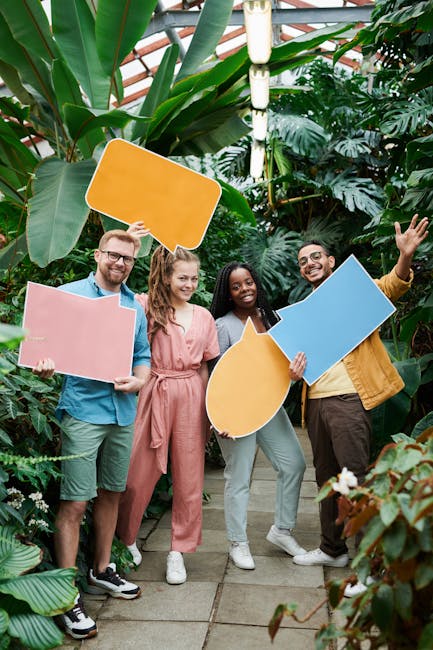 A group of diverse people looking happy and relaxed outdoors.